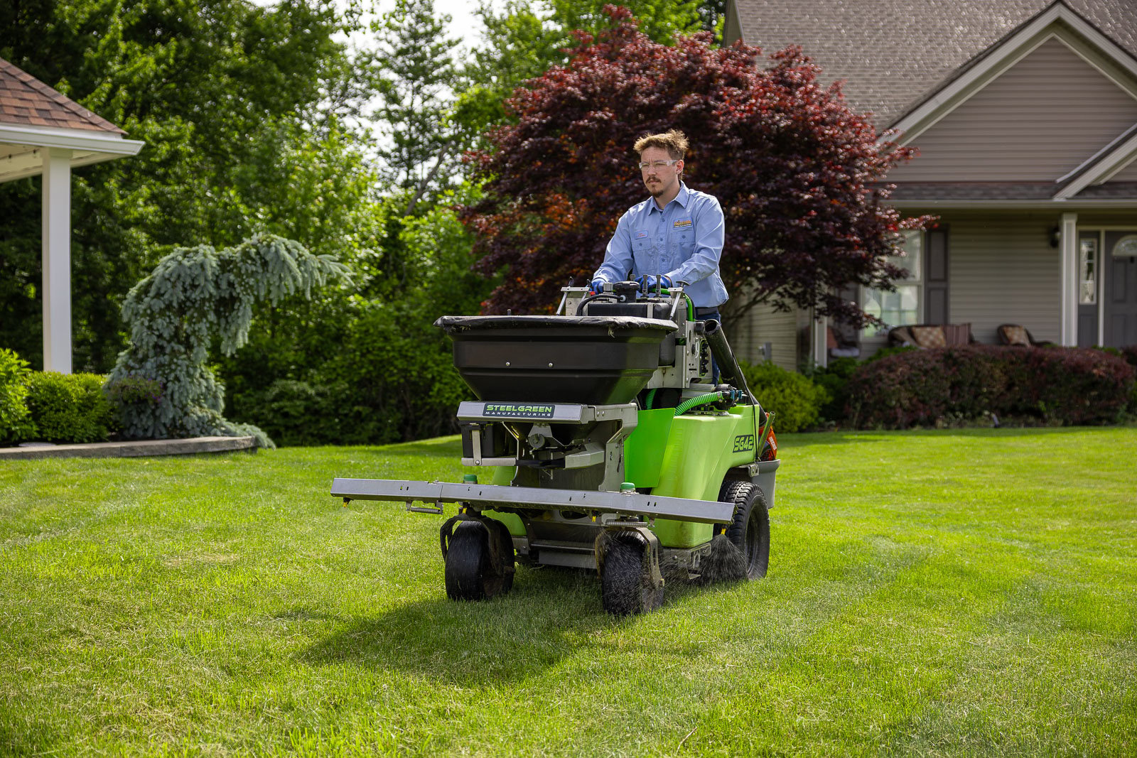 crew lawn care green grass front of house 4