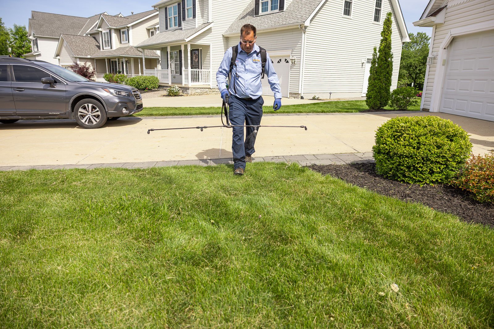 crew lawn care green grass front of house 6