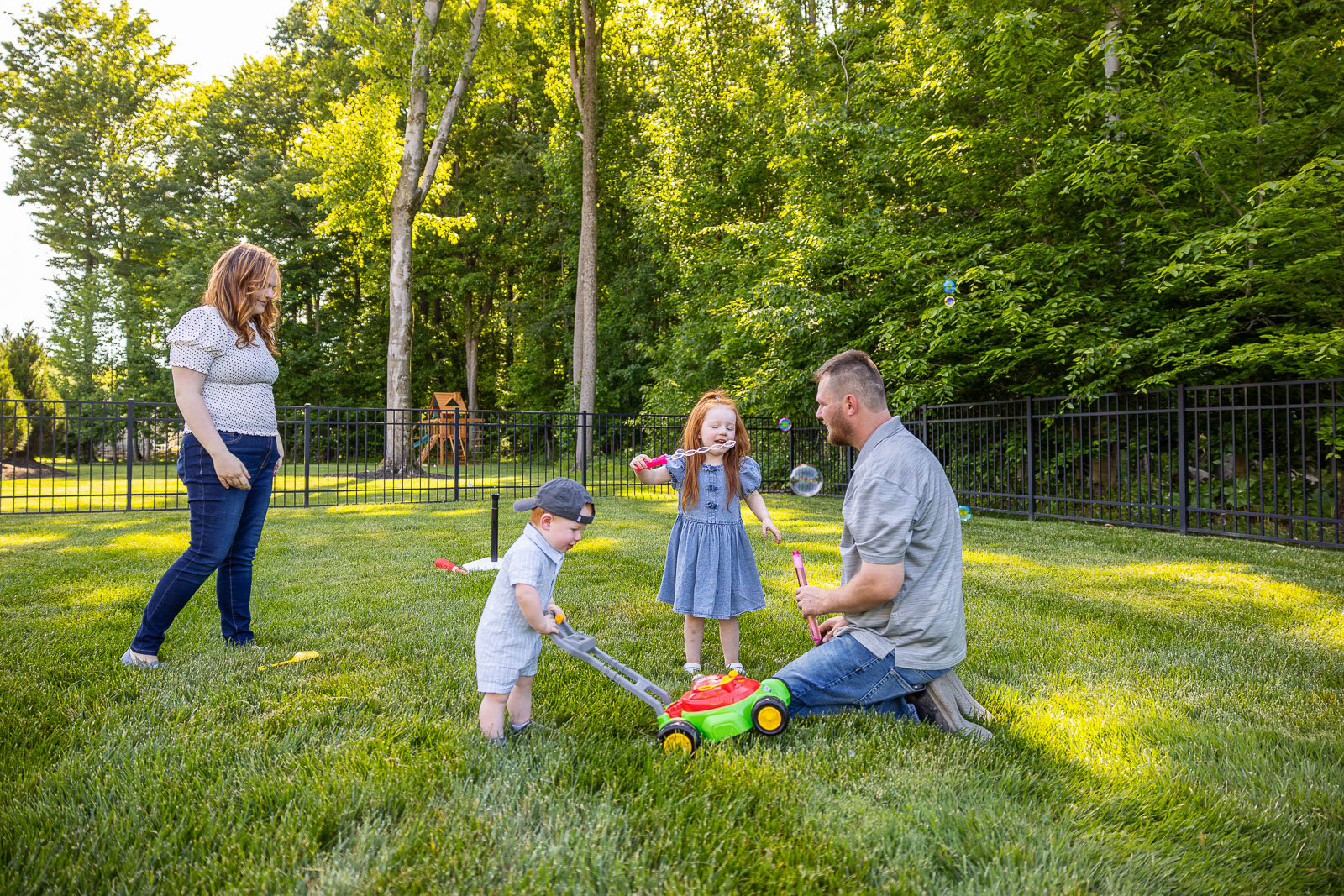 family backyard kids green lawn 5