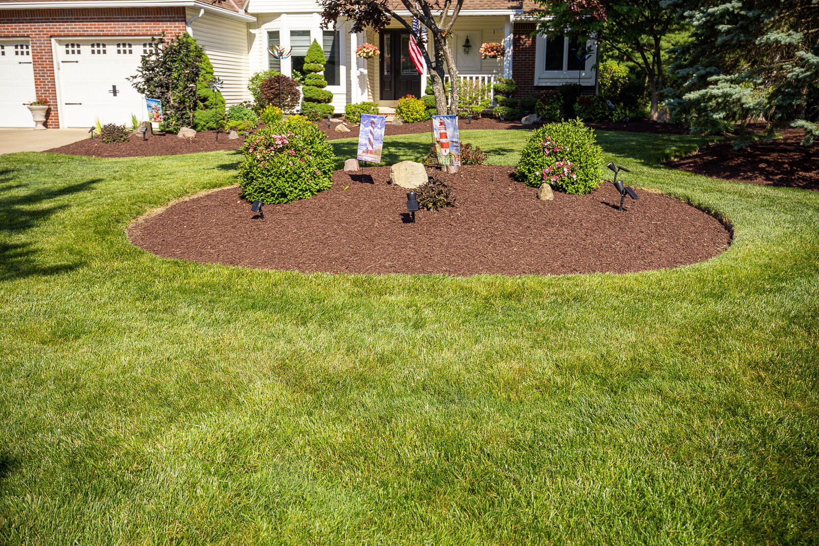 front of house green lawn landscape beds-4