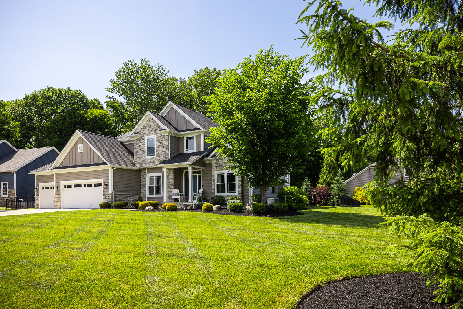 front of house landscape beds green lawn 3