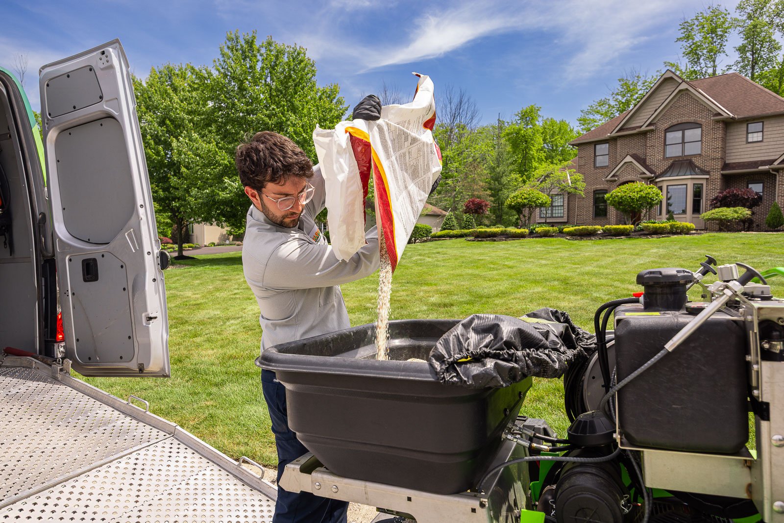 lawn care crew fertilizer truck