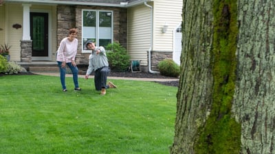 technician showing customer lawn 