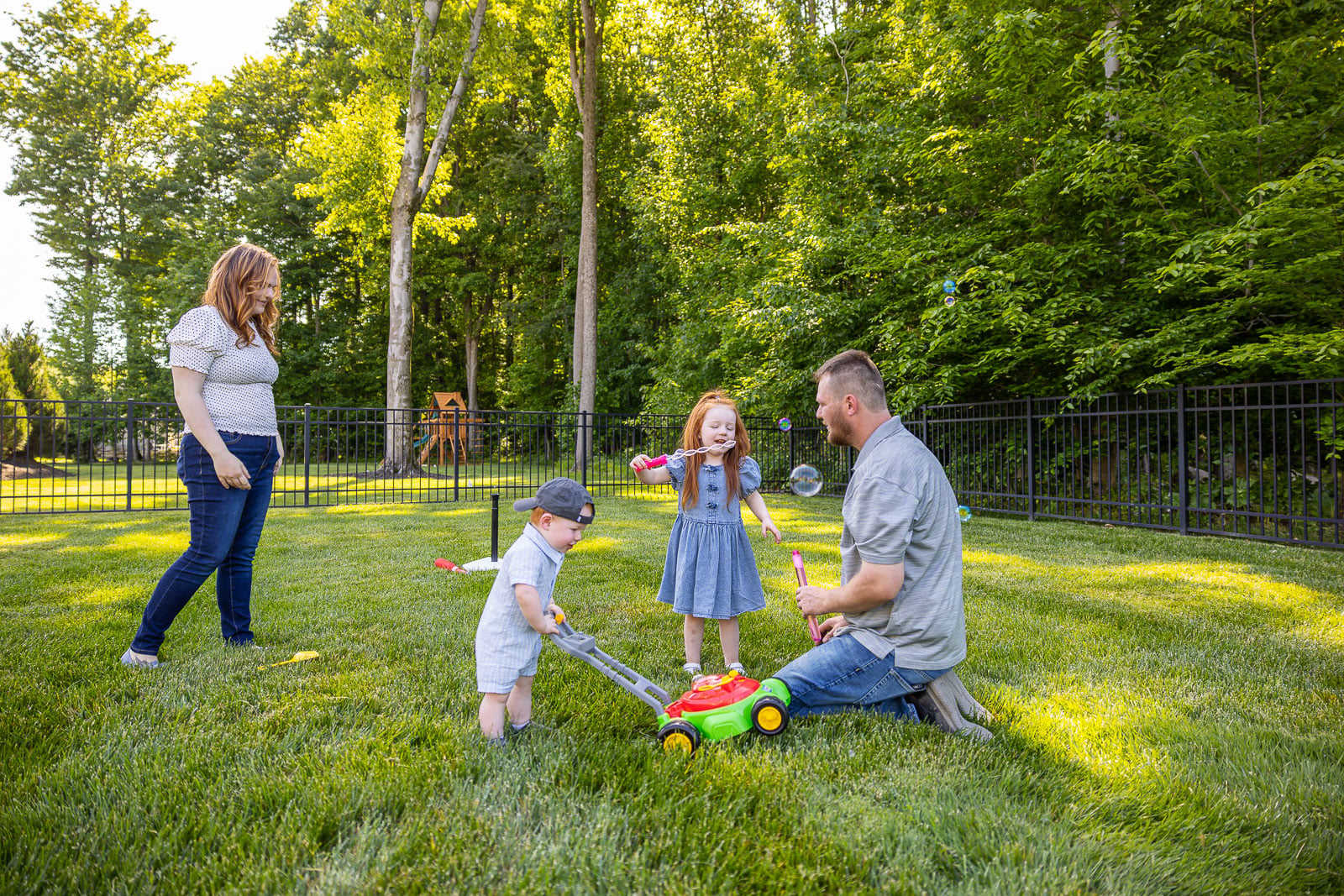 family backyard kids green lawn 5