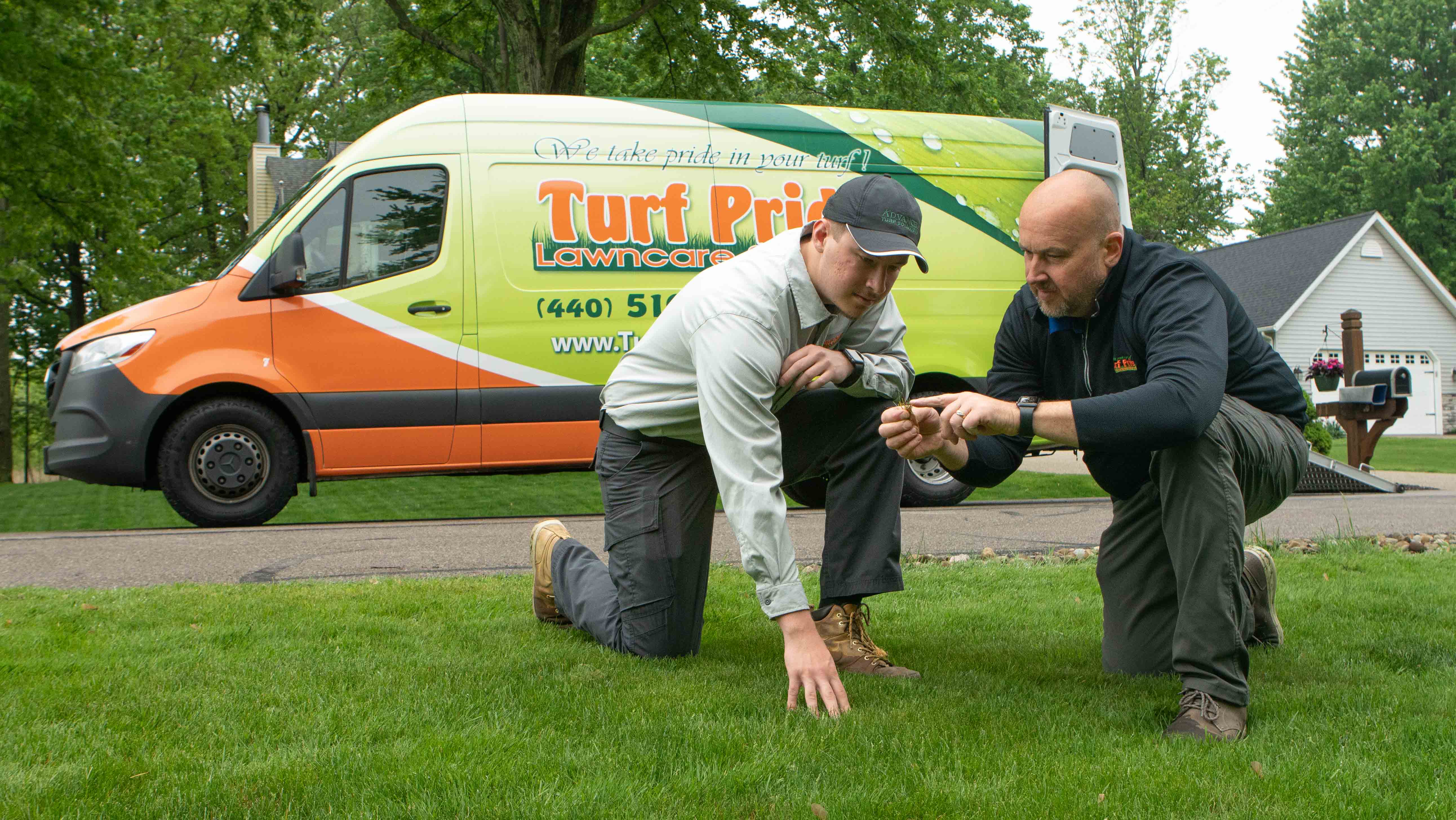 lawn inspection by crew with turf pride truck