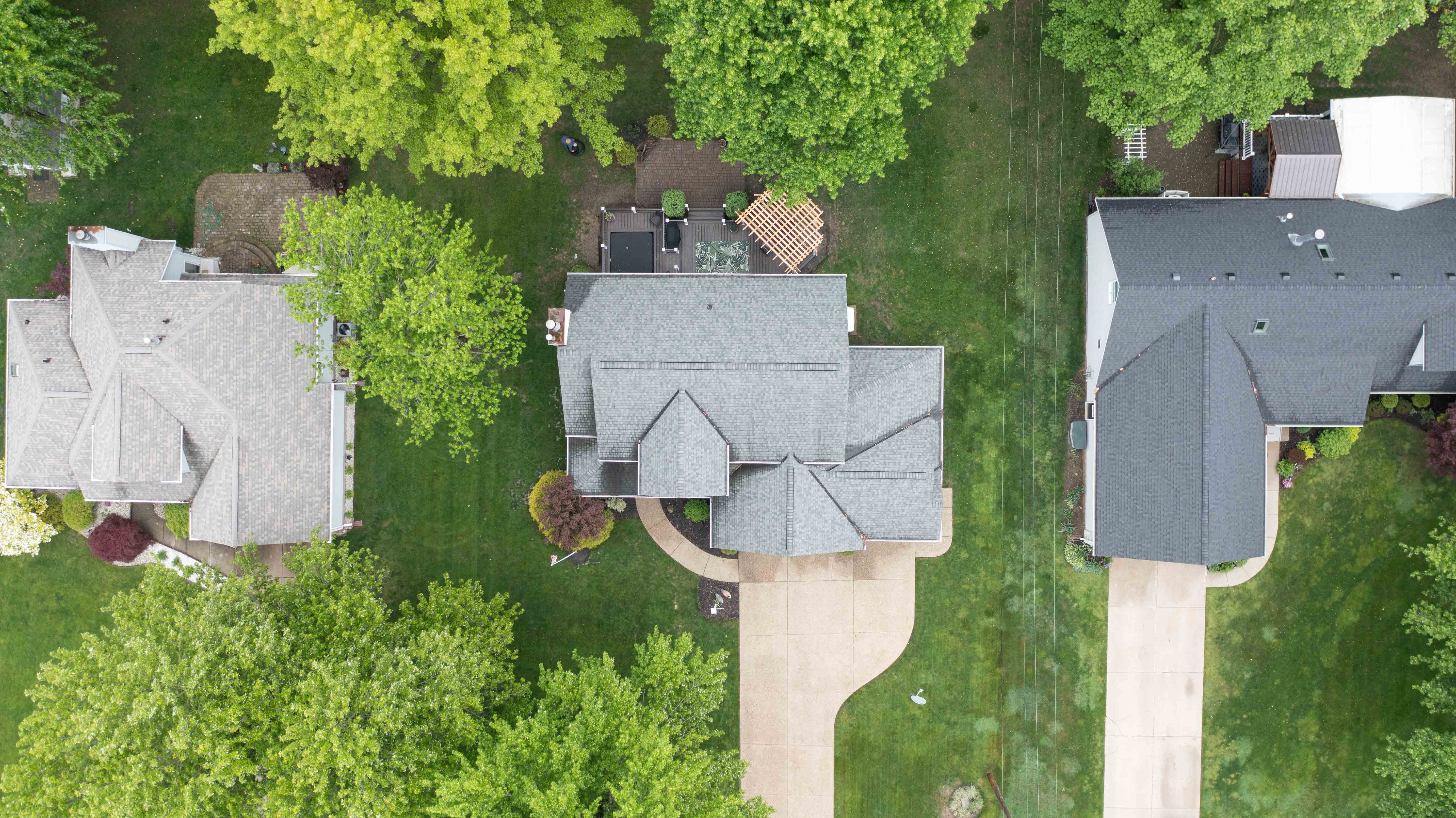 aerial view of house and green grass