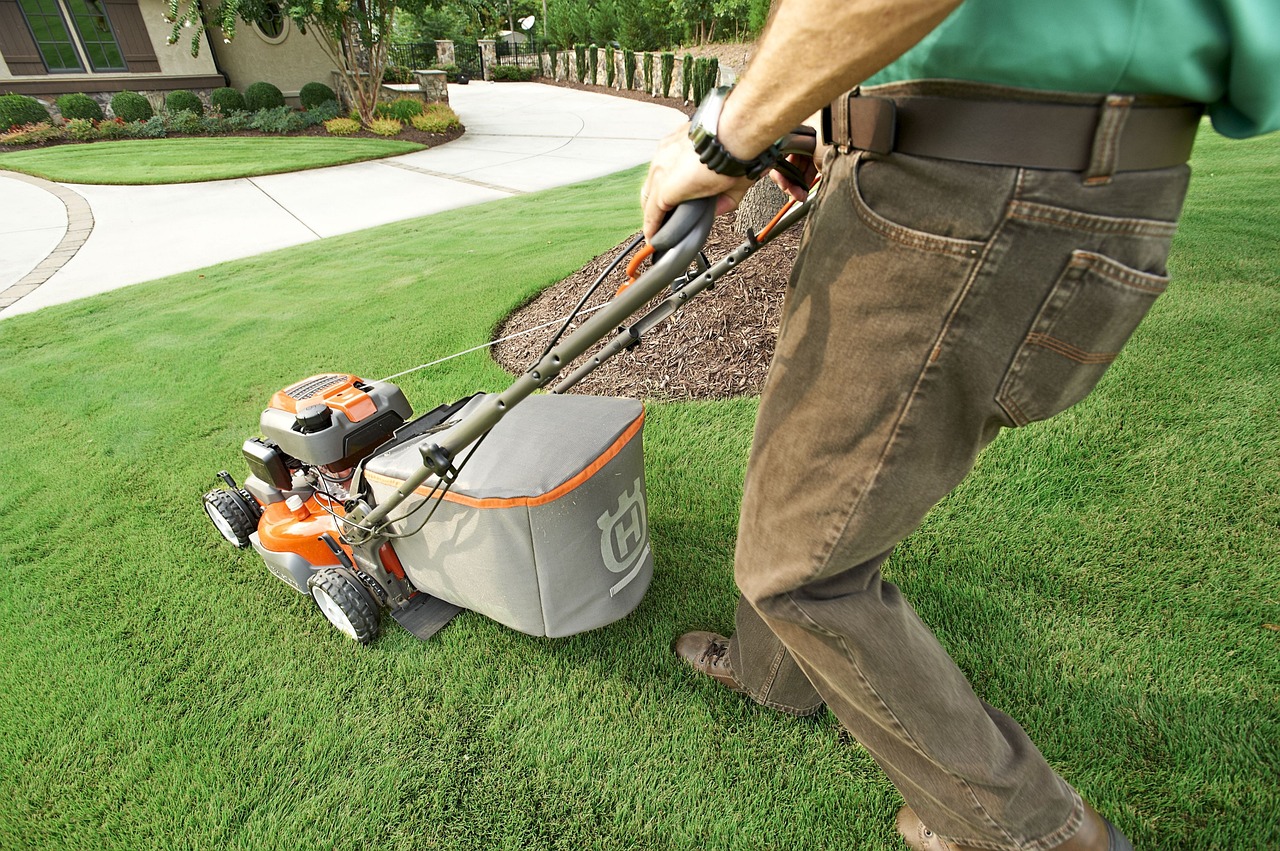 mowing front lawn with mower